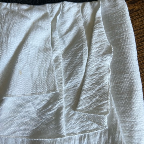 BCBG white skirt size 0. Has small stain and small pills from wear and wash. - Picture 3 of 4